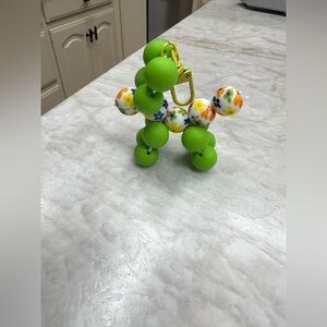 Green Beaded Balloon Dog Keychain with Floral Accents